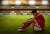 Man sitting on field