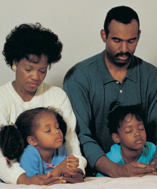 family praying