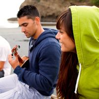 Series of images of Youth playing the guitar, walking and sitting at the beach