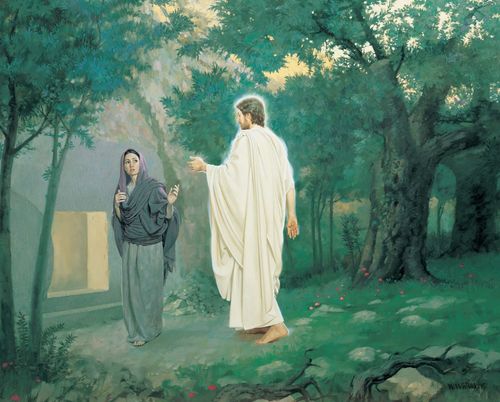 The resurrected Christ in white robes walks through trees to talk to Mary, who is standing outside of the empty tomb.