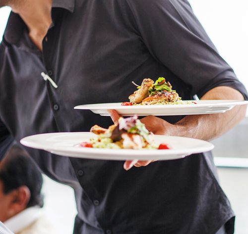 waiter holding food