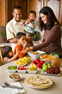 young family eating healthy food