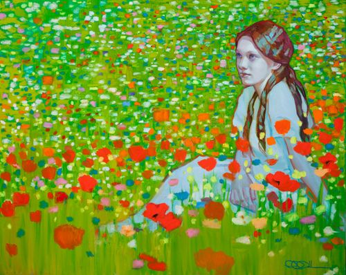 girl sitting among wildflowers