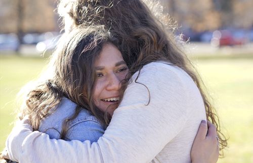 women hugging