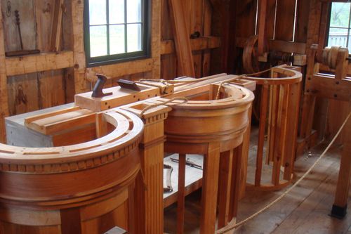A workshop where wooden pews for the Kirtland Temple are being constructed.