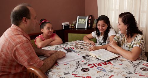 family studying scriptures