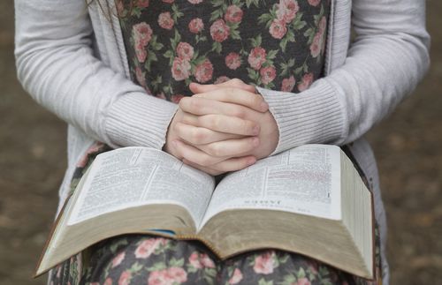 Woman with Bible open