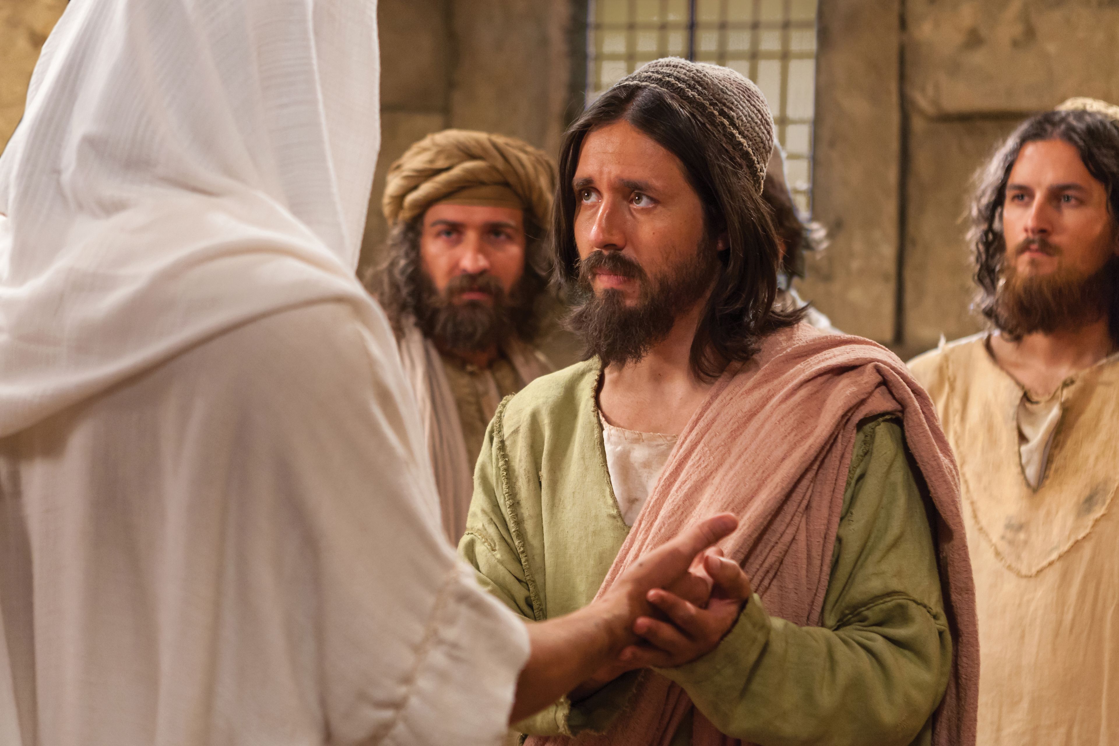 Christ approaches Thomas after Thomas declares that he will not believe unless he sees.