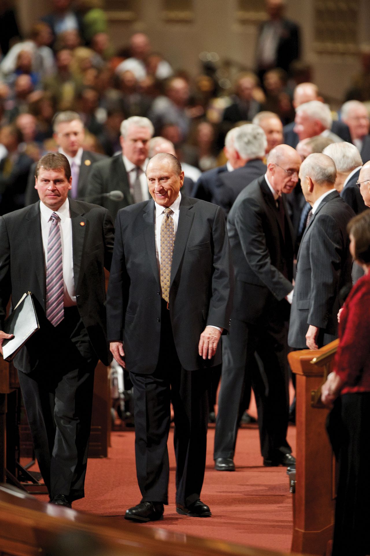 Thomas S. Monson exiting the Conference Center with his security guard.