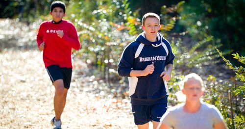 Young men running.