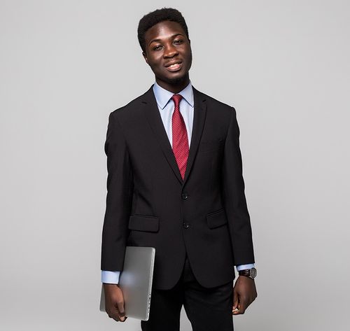 man smiling in a suit