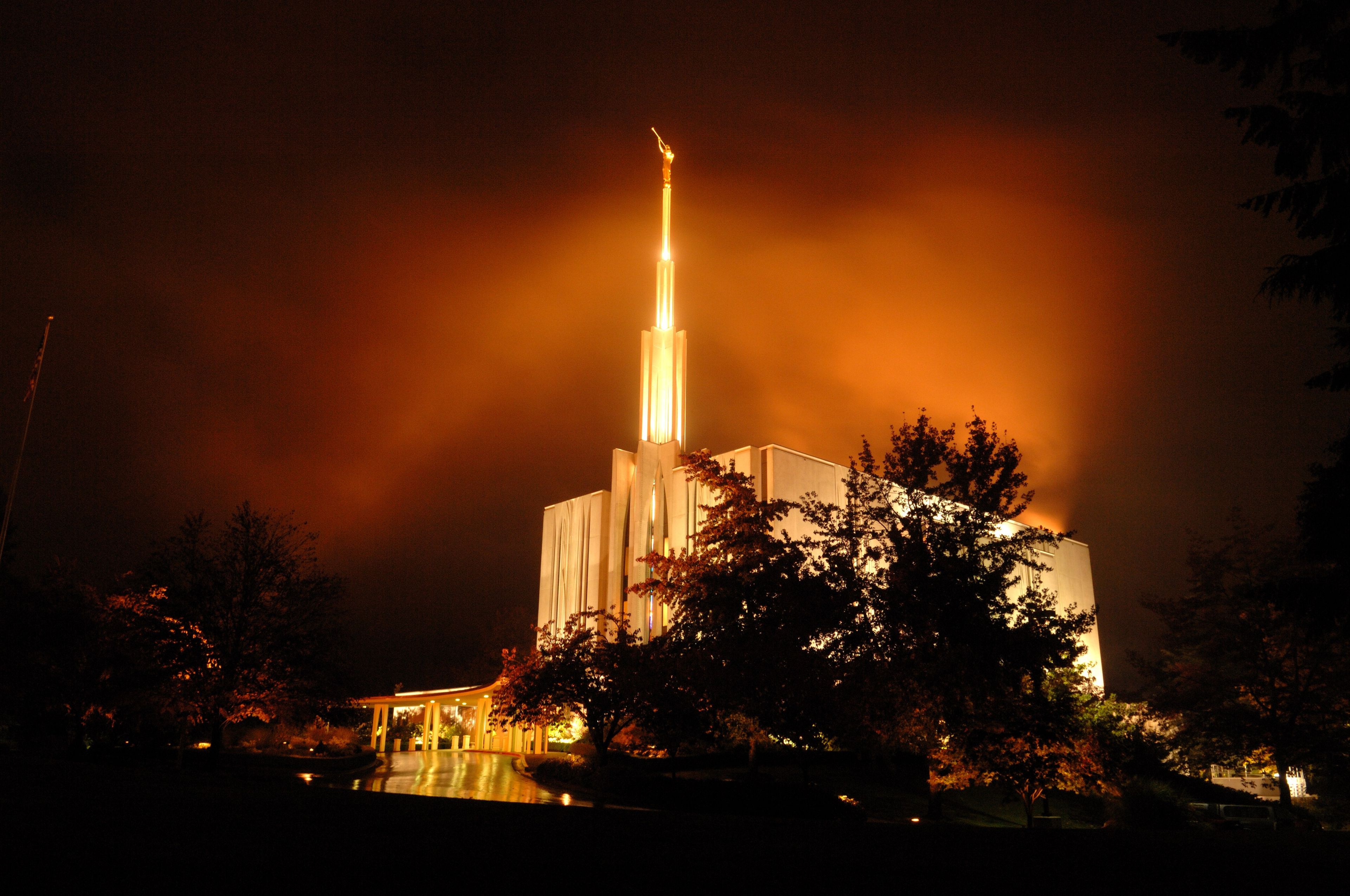The Seattle Washington Temple during a storm, including lights and scenery.
