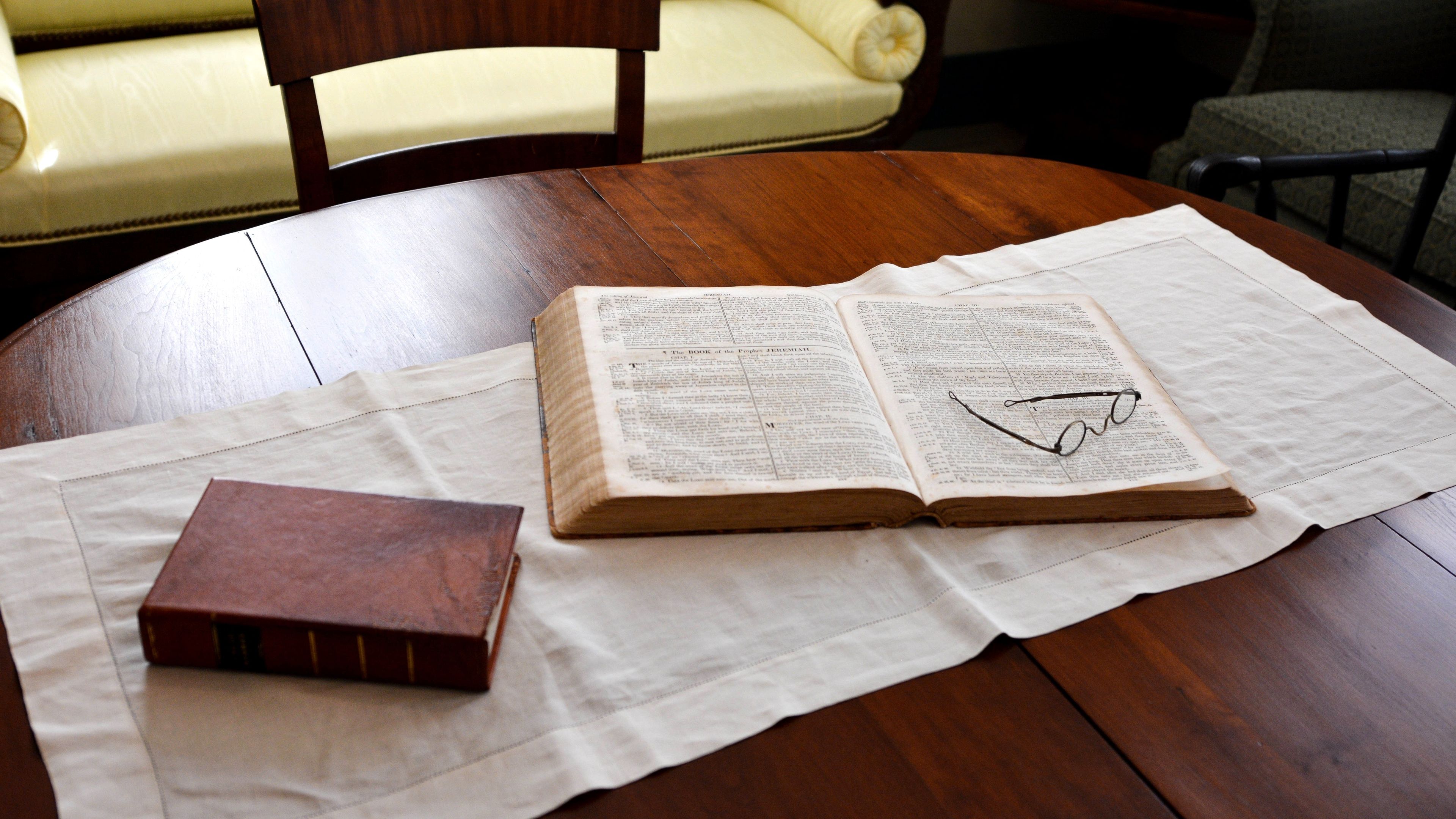 A pair of scriptures open on a table at the John Johnson farm in Hiram, Ohio.