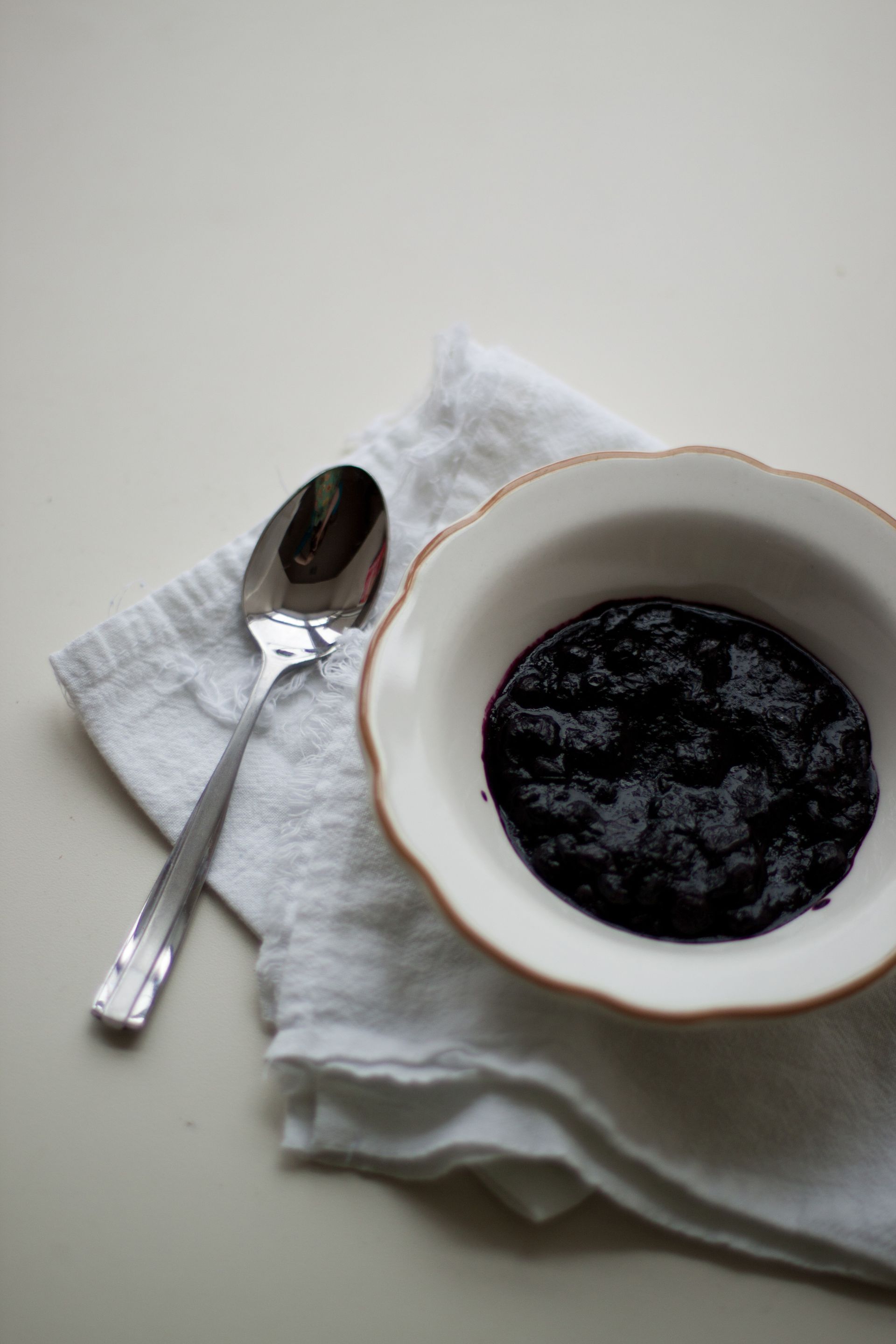 A bowl of dark jam.
