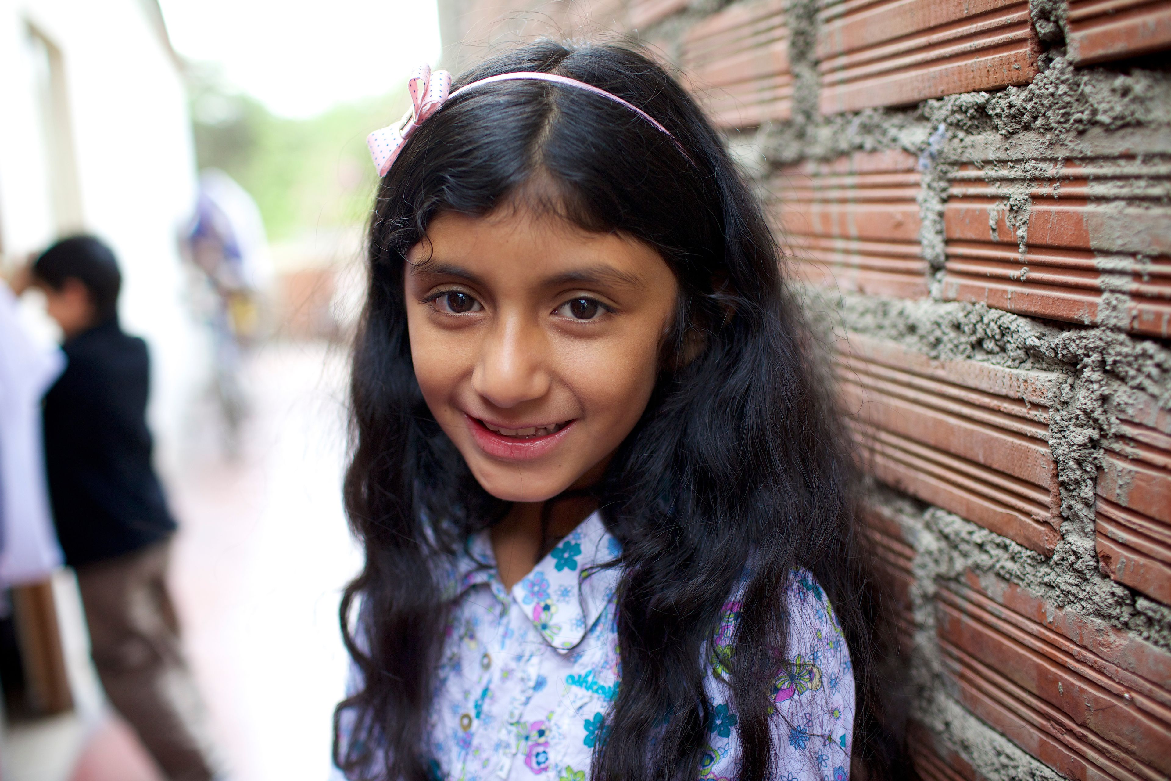A portrait of a young girl in Peru.