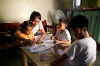 family studying gospel