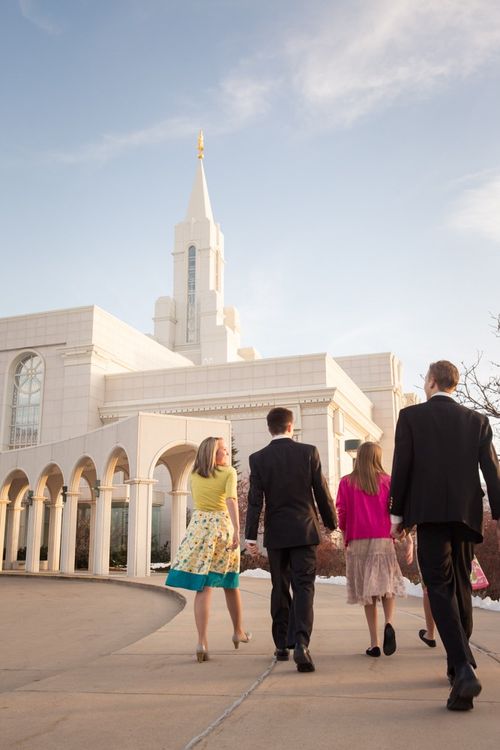 family walking toward temple