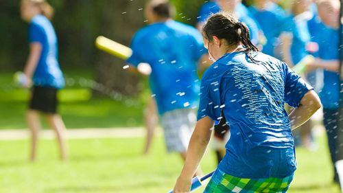 young women having a water fight