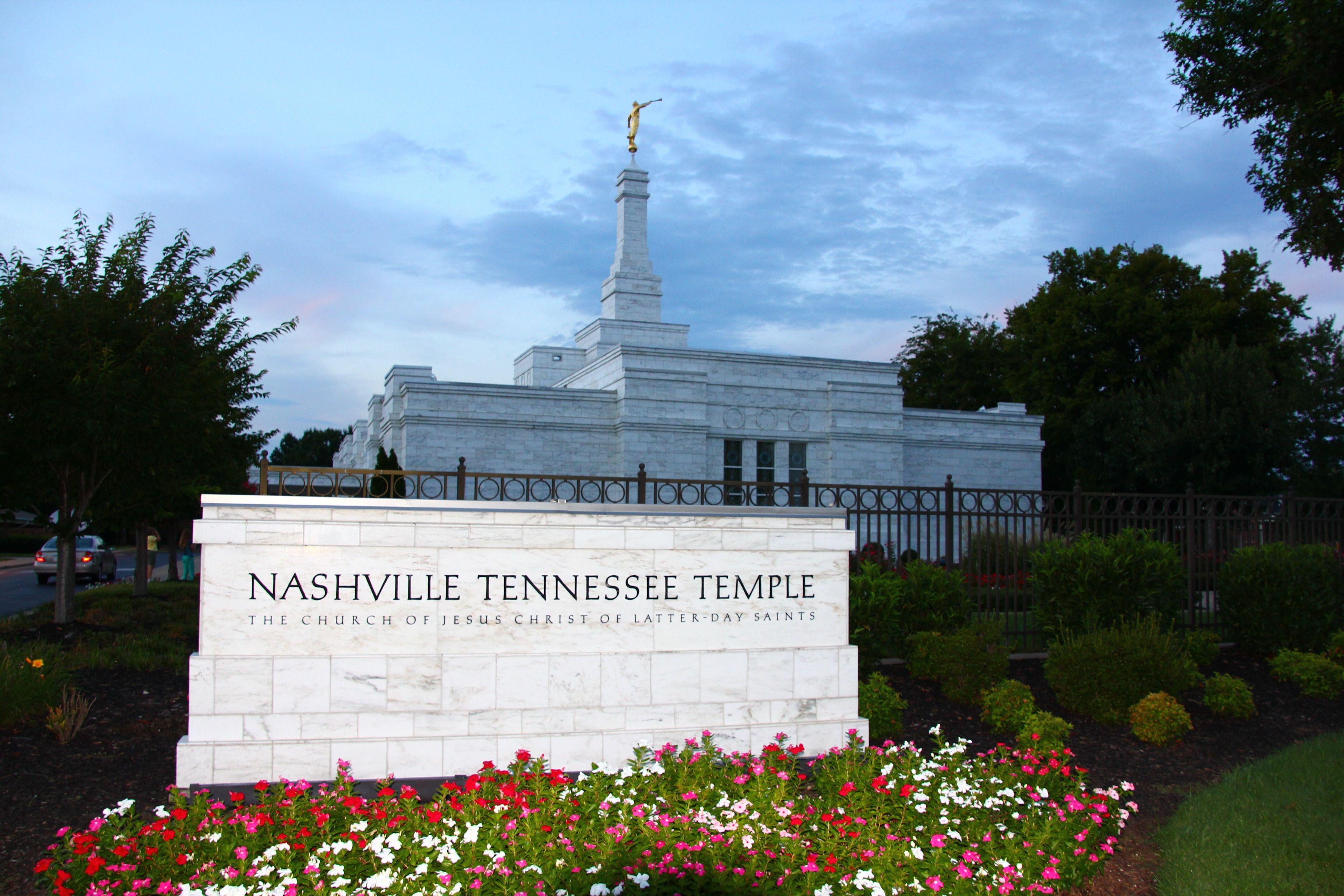 The Nashville Tennessee Temple name sign, including scenery and the exterior of the temple.