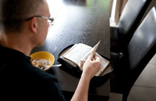 young adult man studing scriptures