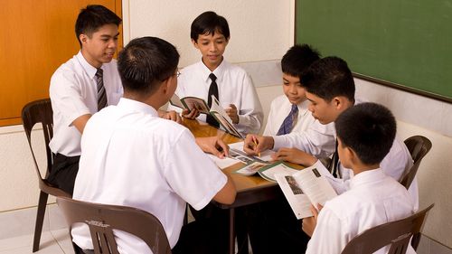 young men studying