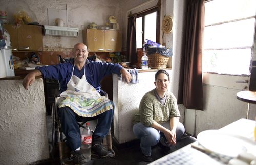 Wilson and his daughter sitting at home