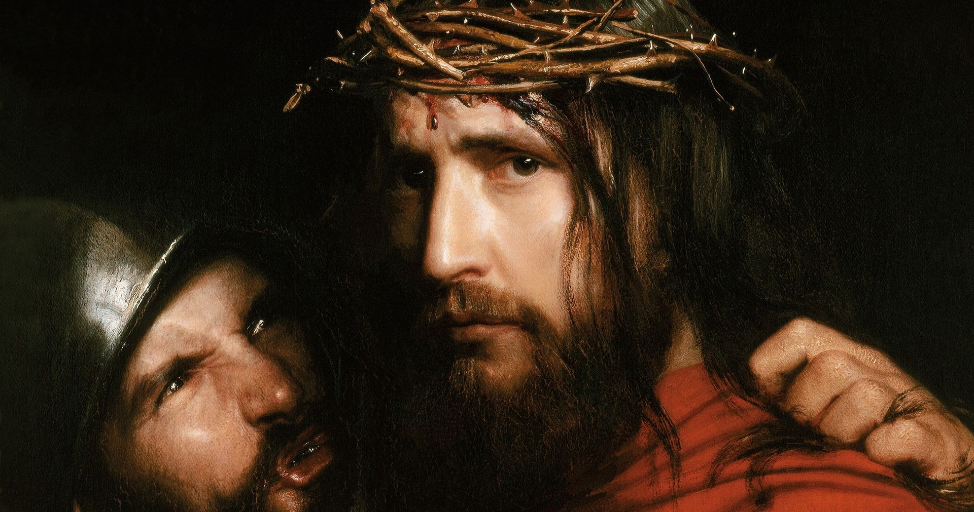 Jesus Christ wearing a crown of thorns with a Roman soldier mocking him.