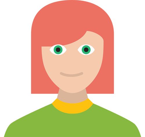 woman with red hair and green shirt