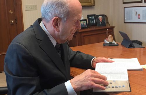 President Nelson studying the scriptures