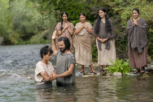 Alma the Younger baptizes believers in the land of Zarahemla.