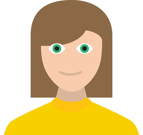 woman with brown hair and yellow shirt