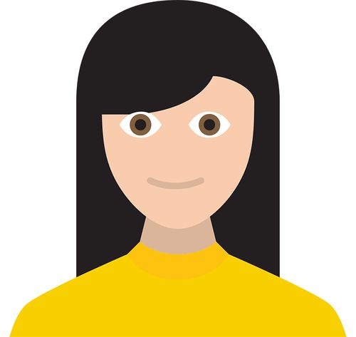 woman with black hair and yellow shirt