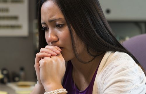 distressed young adult woman