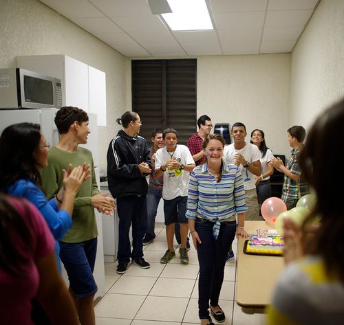 people celebrating a birthday party