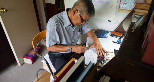 man studying at his desk