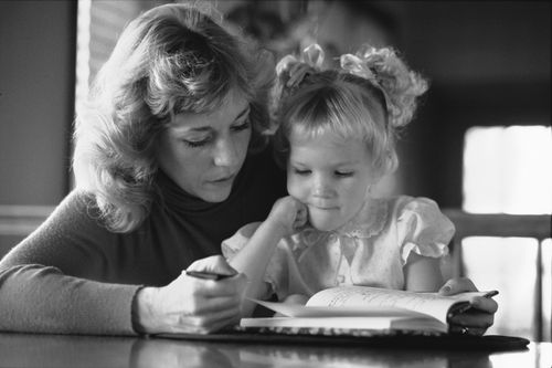 mother and daughter with journal