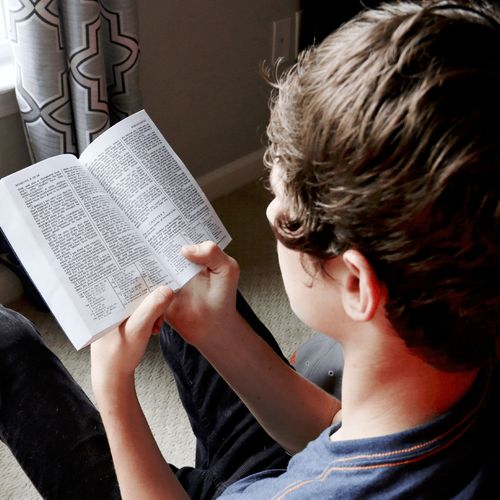 young man reading scriptures