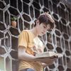 young man reading the scriptures