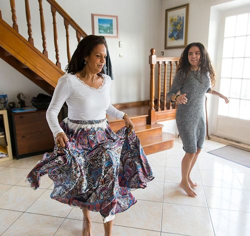 woman dancing in a home