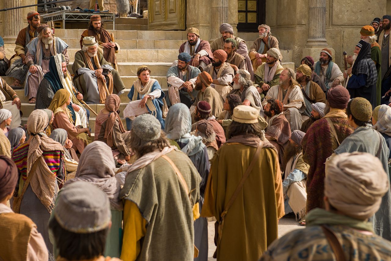 Mary and Joseph find young Jesus teaching professors and theologians at the temple about the gospel