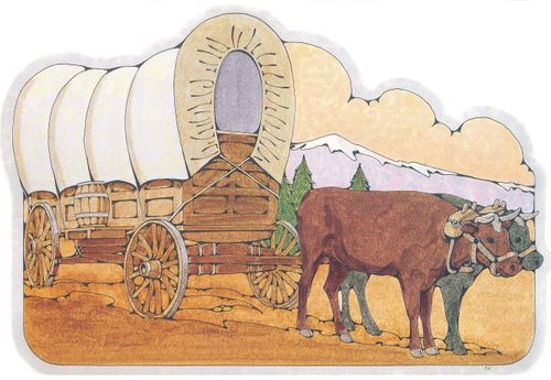 A Primary cutout of a covered wagon on a dirt trail getting pulled by black and brown oxen.