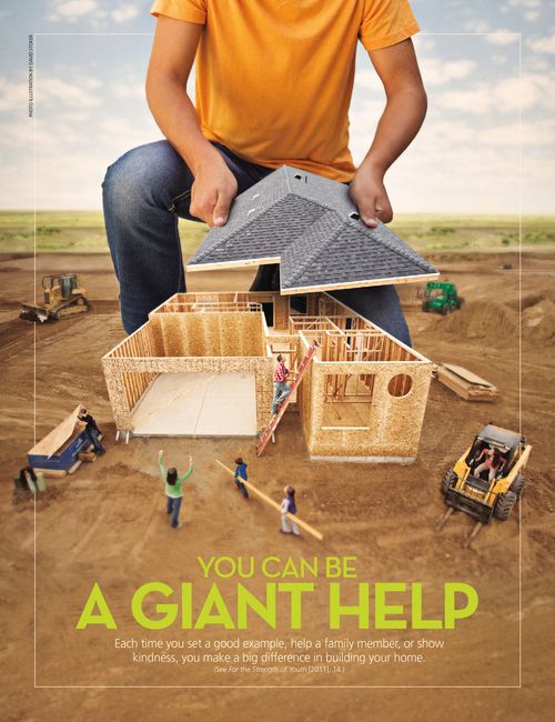 A conceptual photograph showing a giant young man putting the roof on a house that is being built, paired with the words “You Can Be a Giant Help.”
