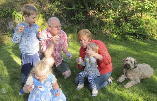 blowing bubbles with grandchildren