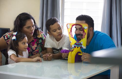 family playing games together