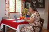 woman sitting in front of computer