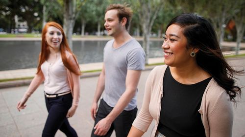 young adults walking together