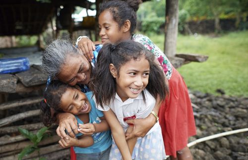 Lini with her grandchildren