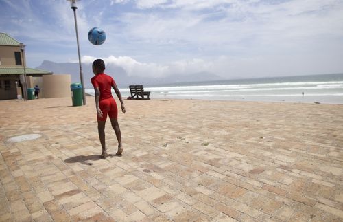 Tendai playing at the beach