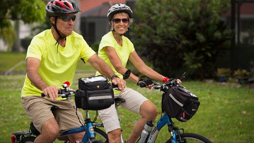 couple riding bicycles