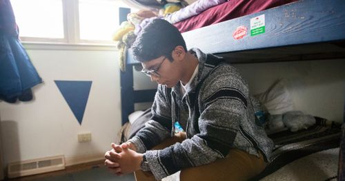 young man praying